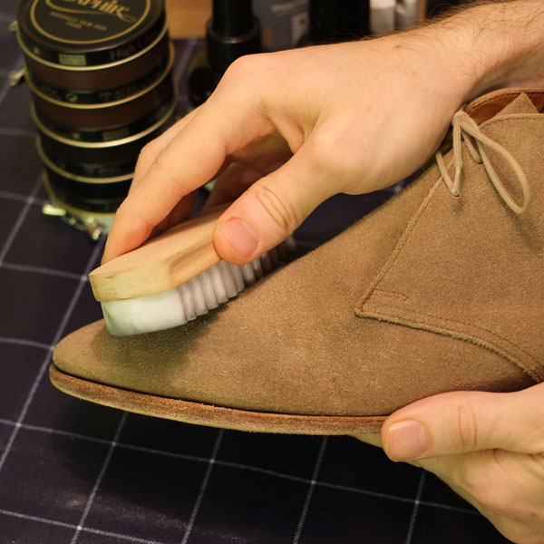Use a suede shoe brush with rubber